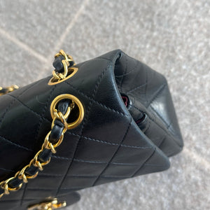 
            
                Load image into Gallery viewer, 1989-1991 Vintage Chanel Small Classic Flap Black Lambskin Gold Hardware
            
        