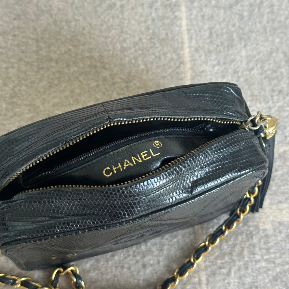 
            
                Load image into Gallery viewer, Vintage Chanel Lizard Skin Tassel Camera Bag
            
        