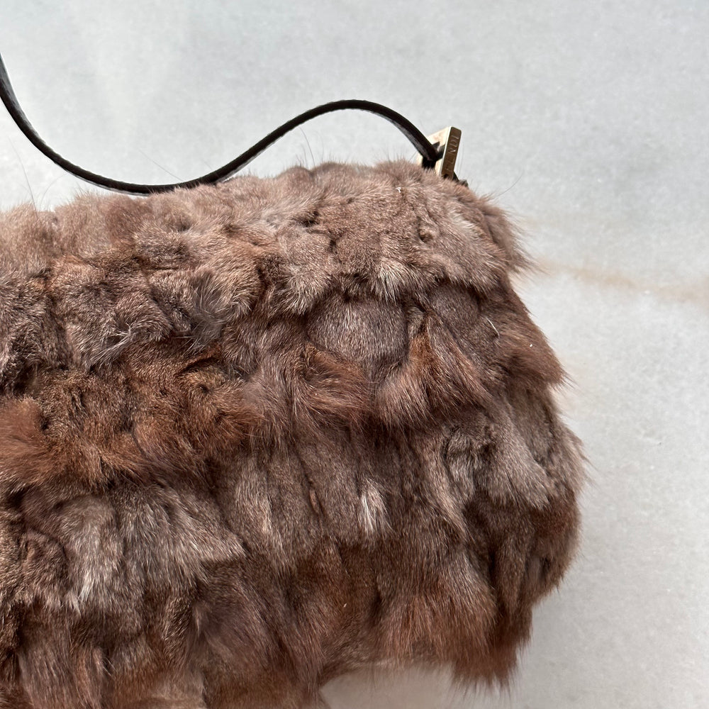 
            
                Load image into Gallery viewer, Vintage Fendi Rabbit Fur Small Zucca Baguette
            
        