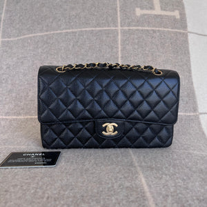 
            
                Load image into Gallery viewer, 2003-2004 Chanel Vintage Caviar Medium Classic Flap in Black
            
        