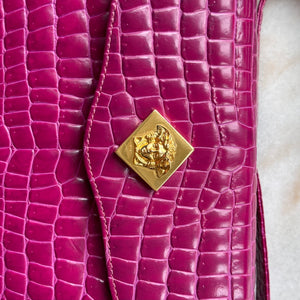 
            
                Load image into Gallery viewer, Mystery Auction - Vintage Versace Fuchsia Embossed Crocodile Shoulder Bag
            
        